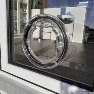 A Pet-Tek G-SDDC Clear Maxi-Dual Glaze 4-way locking cat flap fitted by Just Cat Flaps Ltd to a double-glazed bi-fold door